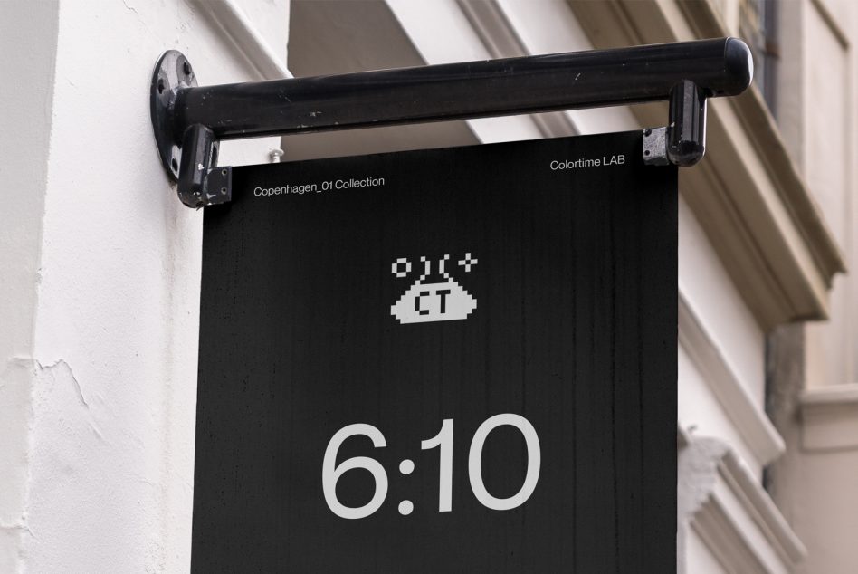 Modern wall-mounted sign mockup with minimalistic clock design and pixelated graphic, displayed outdoors for urban branding, templates category.